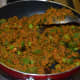 Step six: Stir-cook the mix on low heat till it becomes almost dry and leaves the bottom.