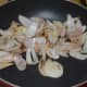 Step four: Saute onions in the same pan till they turn light golden brown on all sides. Add the onions to the plate.