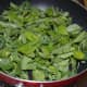 Step five: Add fenugreek leaves to the same pan. Saute till they wilt and get cooked. Collect them in a bowl.