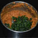 Step seven: Add sauteed fenugreek leaves. Grind or pulse until it blends completely with the other ingredients.