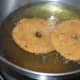Make two such vadas in a batch. Fry them till they become very crispy. For that, you have to fry them for a longer time on low heat.