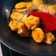Deep-fry the cucur udang.