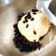 Add the raisins into the dough.