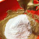 Gradually, add the flour mixture into the wet mixture.
