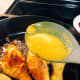 Using a spatula or spoon, pour the sauce on the chicken.