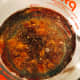 Add the dates to the boiling water and baking soda. Set aside.