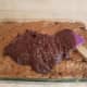 Spread this mixture evenly over the top of your chocolate chip cookie layer.