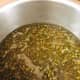 Transfer the mung beans to a larger pot, add water. Let the water to boil. 