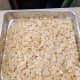 Dump the sliced almonds on a tray and bake for 5 minutes in the oven.