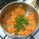 Chopped coriander is added to the mashed sweet potatoes