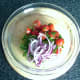 Salad ingredients are combined in a small bowl