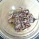 Sardines are mashed with the back of a fork