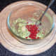 Guacamole ingredients are combined in a bowl