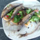 Enjoying paprika spiced sardines and chorizo salad on toast