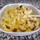 Gently fold the torn up bread into the casserole. Be sure to combine the ingredients well.