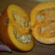 Use a sawing motion to carefully cut your pumpkin in half.