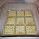 The first layer of crackers.