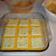 Third layer of crackers, with a heavier layer of cheese underneath.