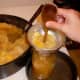Use a wooden spoon handle to help any thick parts go down. Fill to within 1/2" of the top.