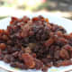 A plate full of juicy, sweet sultanas.
