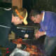 Preparing to cut up the cooked pig.