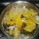 Tinolang Manok Simmering on the Stove