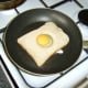 Pan frying the eggy bread