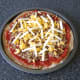 Cheese tops spicy beef