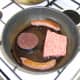 Pan fry the sausages and black pudding