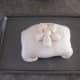 Place wrapped ham seams down on cookie sheet and use leftover dough for decoration.