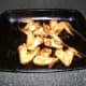 Cooking tongs are the best tool for lifting the chicken wings to the serving plate