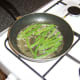The green beans are fried in butter, garlic, sea salt and black pepper.