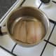 Cut your whiting fillet in half and lay it in the bottom of a pot or saucepan