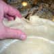 With this crust, just pull down the dough that belongs, and push it all back together