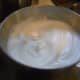 Beaten egg whites with soft peaks. 