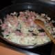 Gently fry the bacon and onions in oil