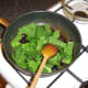 Savoy cabbage and garlic is sauteed in butter