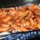 Bake the shrimp in a foil-lined baking pan for 30 to 40 minutes, turning every 10.