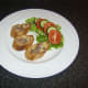 Chunky chicken liver pate served on hot toast with simple salad.