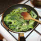 Savoy cabbage is sauteed with garlic