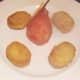 Poached pear is plated