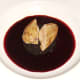 Partridge breast is laid on black pudding