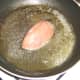 Pan frying the partridge breast in butter