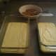 Half-filled loaf pans, ready for a layer of the sugar mixture.