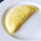 Cheesy duck egg omelette is plated