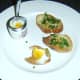 Tucking in to coddled duck egg and bruschetta