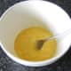 Beating duck eggs for omelette