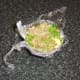 Duck egg fried rice is shaped for plating