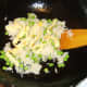 Duck egg fried rice is brought together