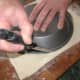 Turn the pie dish upside-down and cut around the outside for a pastry template.
